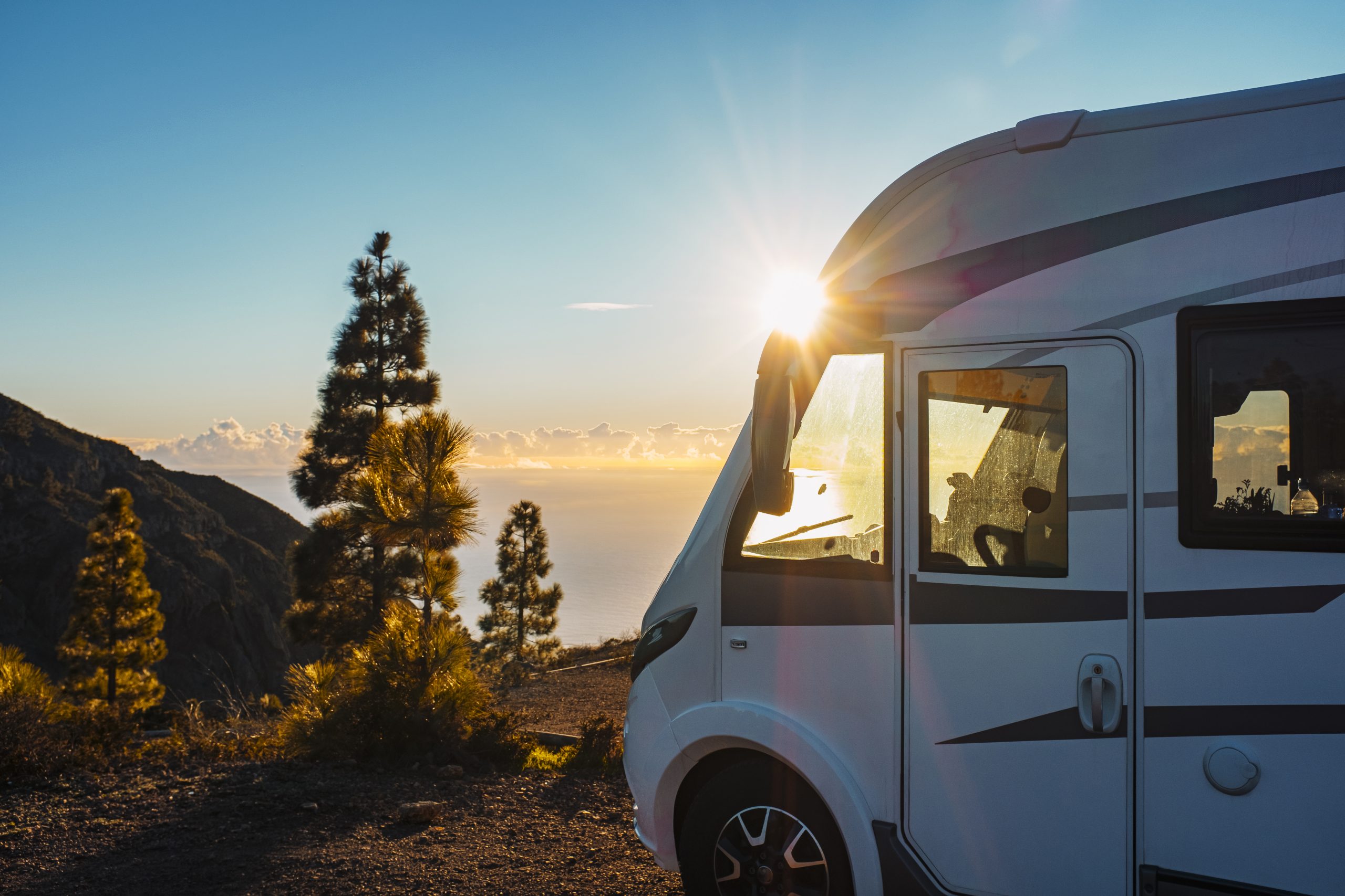 beautiful-sunset-background-modern-camper-van-parked-nature-enjoy-freedom-vanlife-alternative-lifestyle-travel-people-family-tourism-concept copy